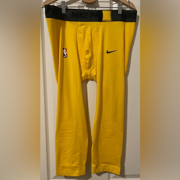 yellow nike compression pants
